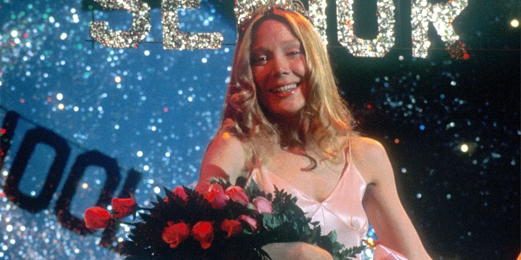 Sissy Spacek holding up flowers at the prom in Carrie (1976)