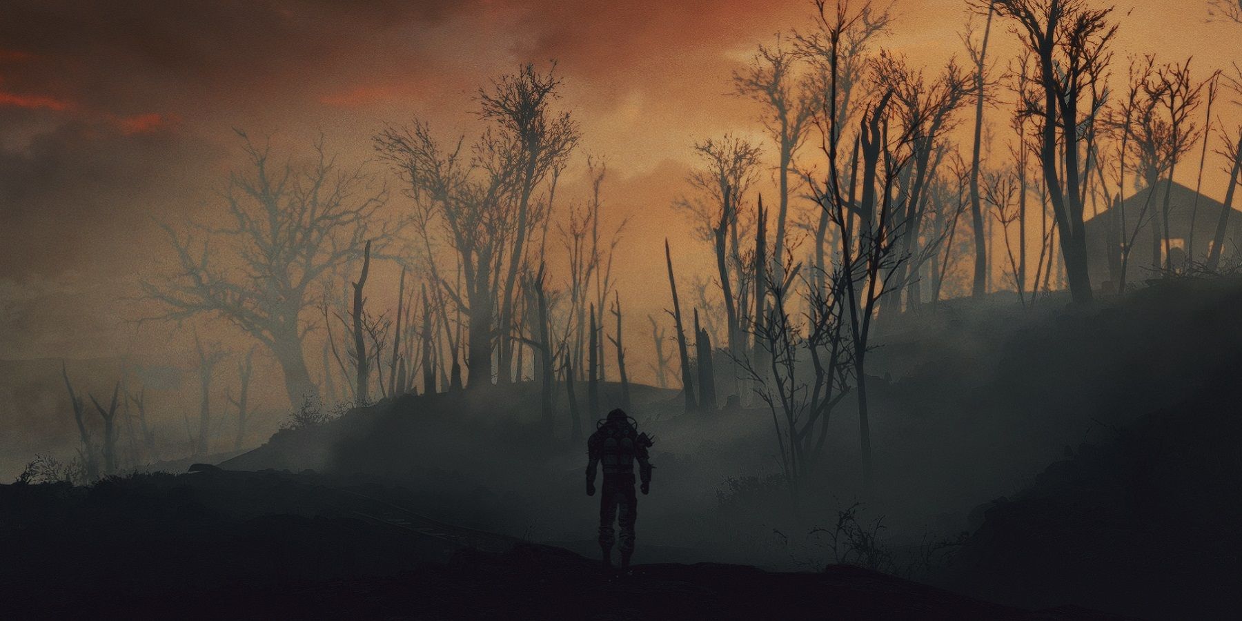 Image from Fallout 4 showing a desolate wasteland with an orange glow in the sky.