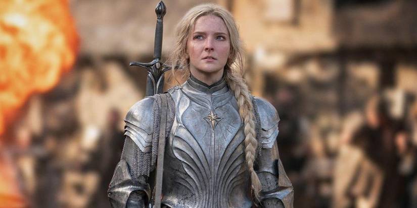 Galadriel walks in full elven armor with sword slung across her back