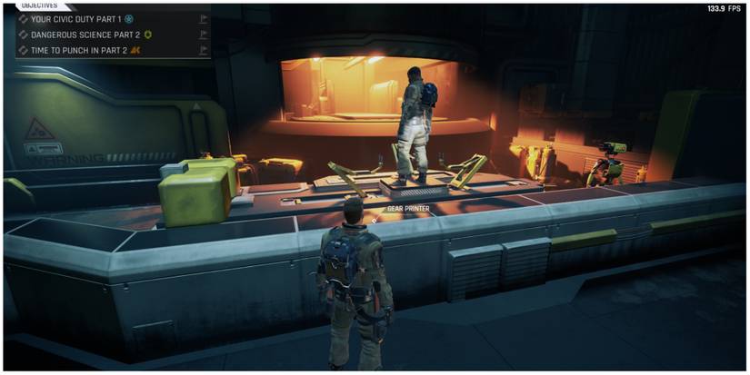 The Cycle Frontier player standing near gear printer while another stands on top of it