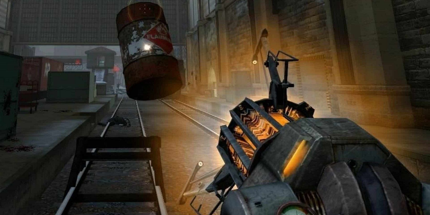 Image from Half-Life 2 showing the gravity gun lifting a red barrel.