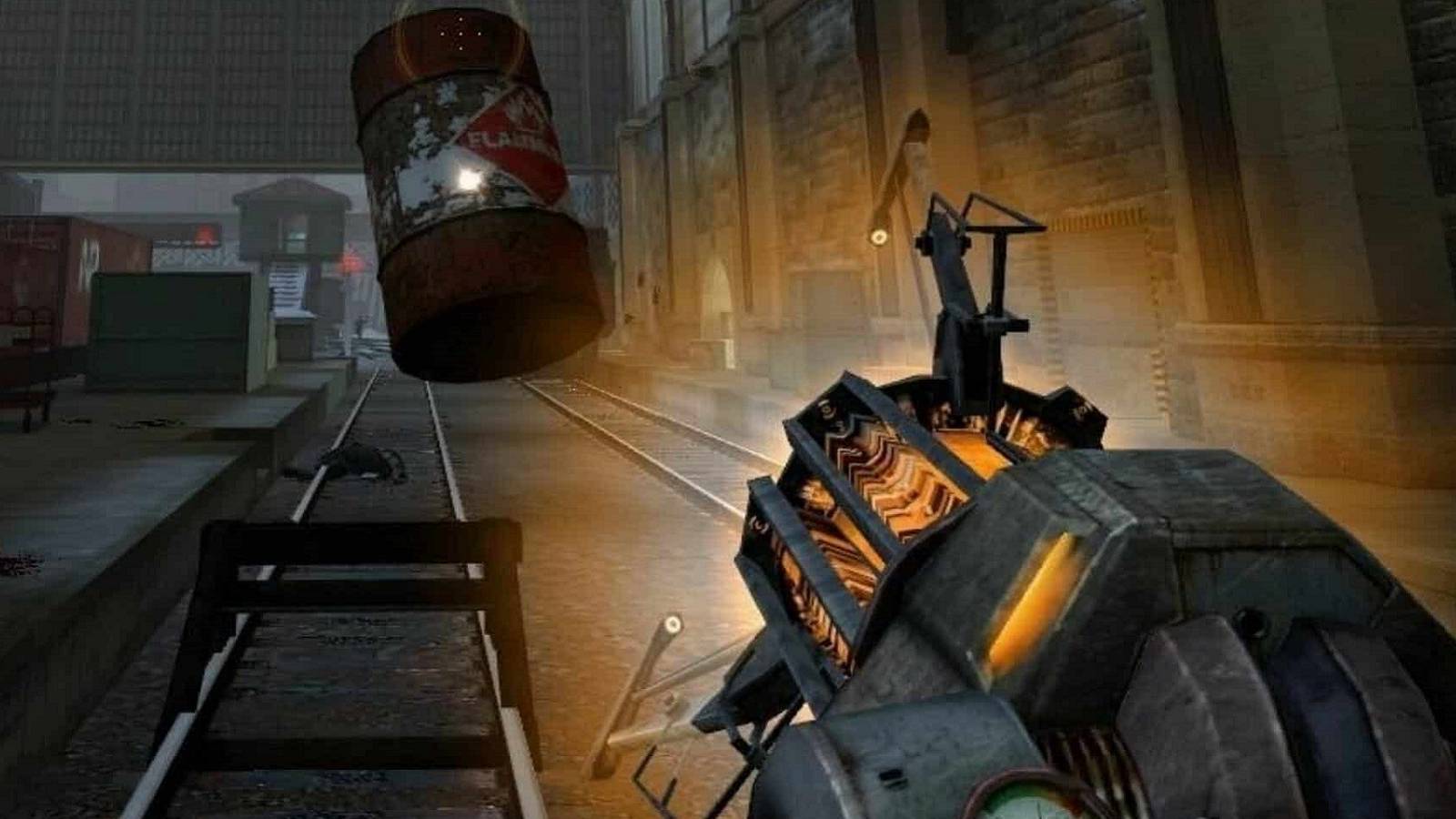 Image from Half-Life 2 showing the gravity gun lifting a red barrel.