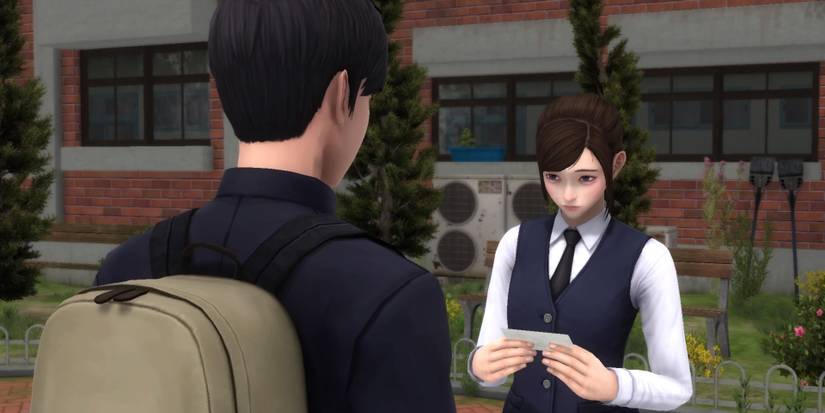 So-Young and Hee-Min at the start of the game, she takes back the picture he picks up