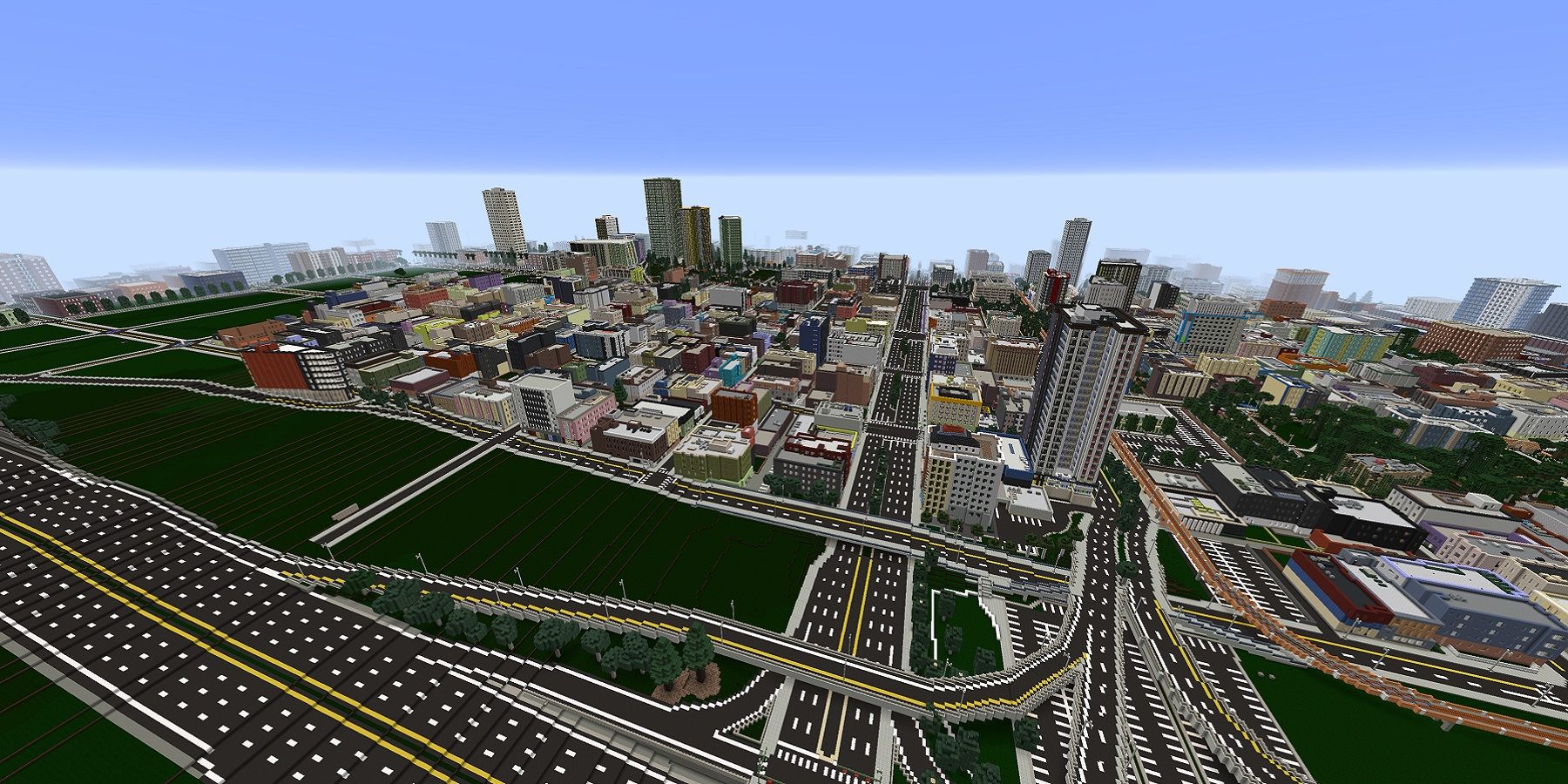 Screenshot from Minecraft showing a wide angle shot of a modern-looking city.