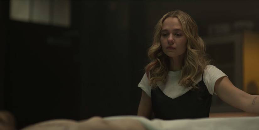 Sam looks at Charlie's corpse in American Horror Stories "Necro"