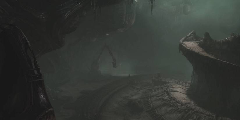 Image from horror game Scorn showing the dark H R Giger-esque interior.