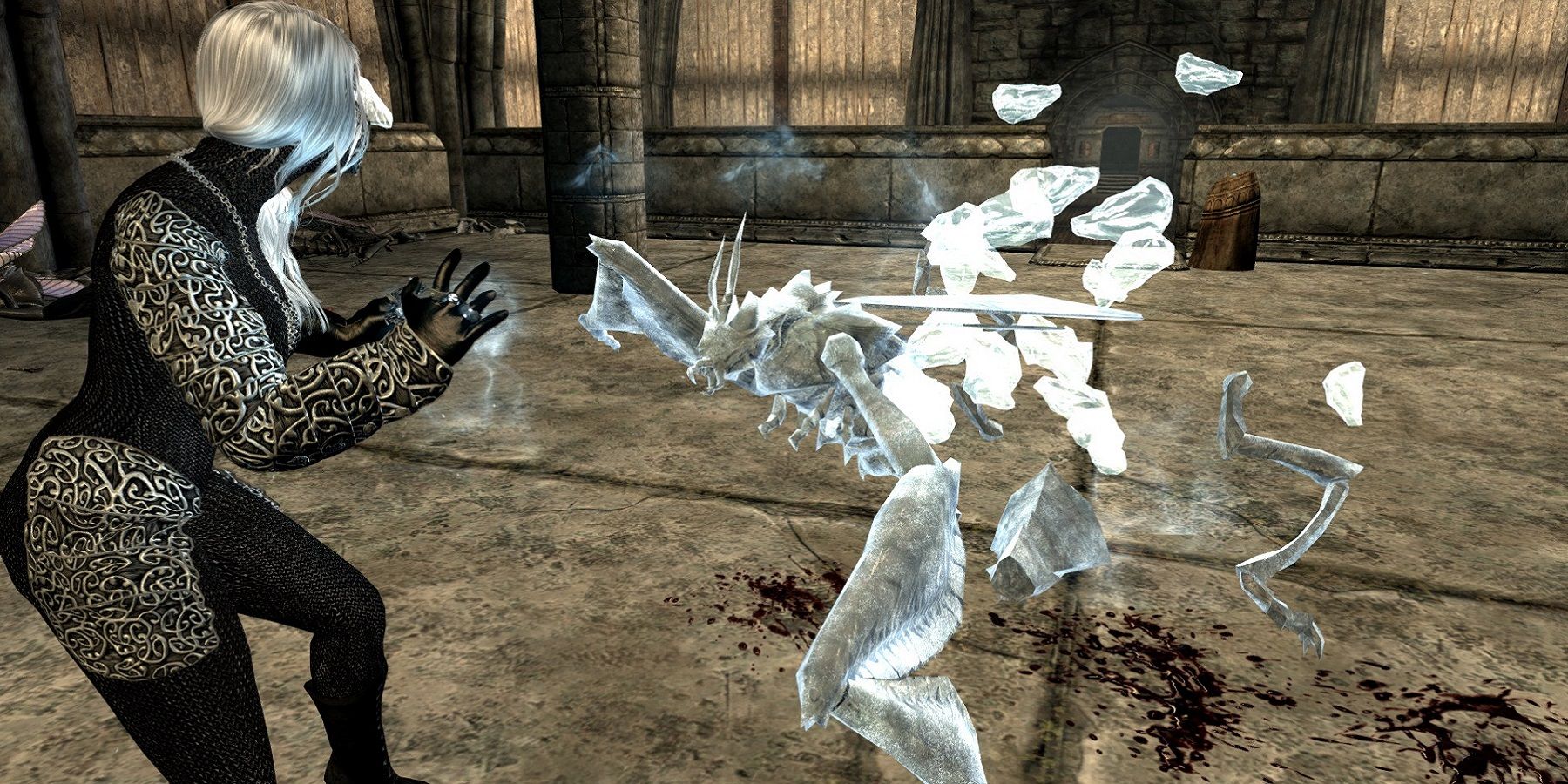 Image from Skyrim showing a character making an enemy exploding into ice pieces.