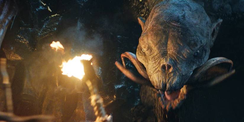 The snow troll looms above the elven soldiers