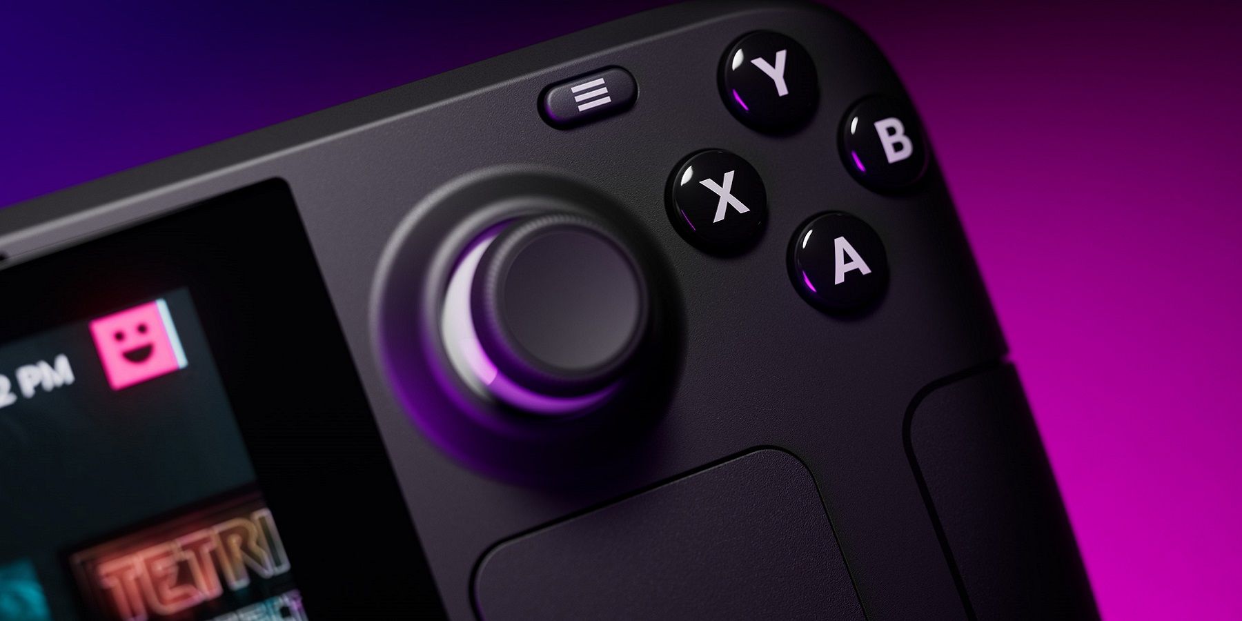 Close-up photo of a Steam Deck showing the right analog stick and right buttons.