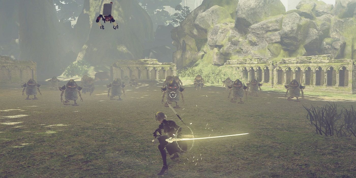 2B preparing a charge attack in Nier Automata.