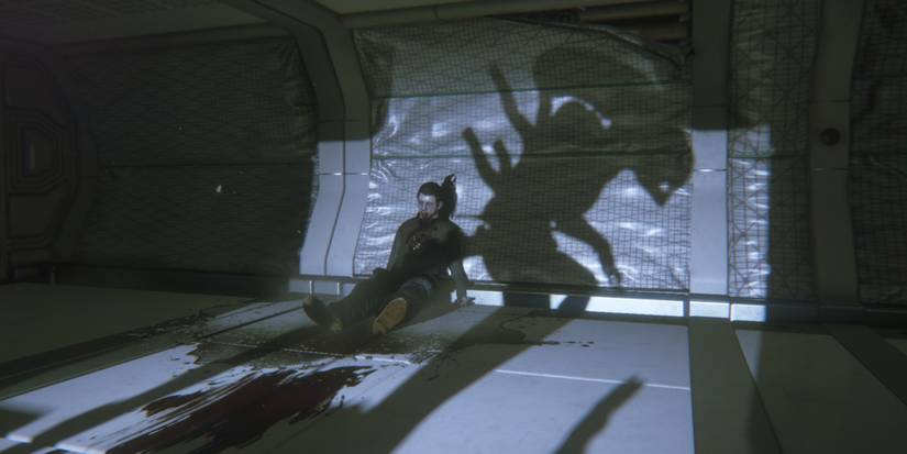 Alien Isolation xenomorph shadow across dead body