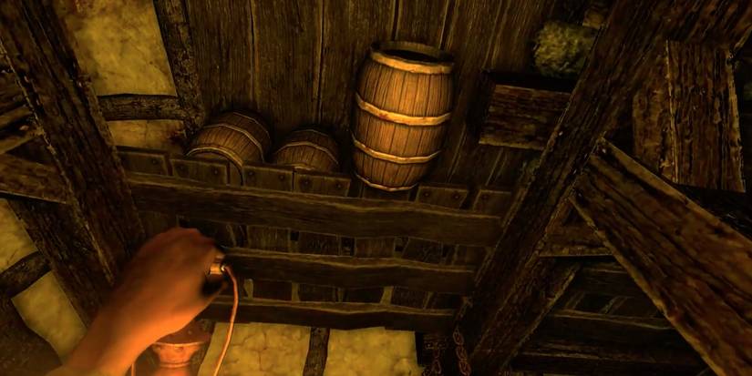 Player is about to be hit by a falling barrel 