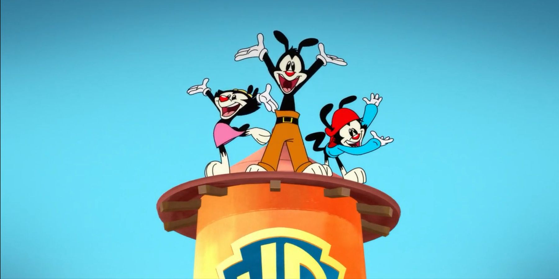 The Animaniacs, Yakko, Wakko, and Dot, on top of the Warner Bros' water tower.