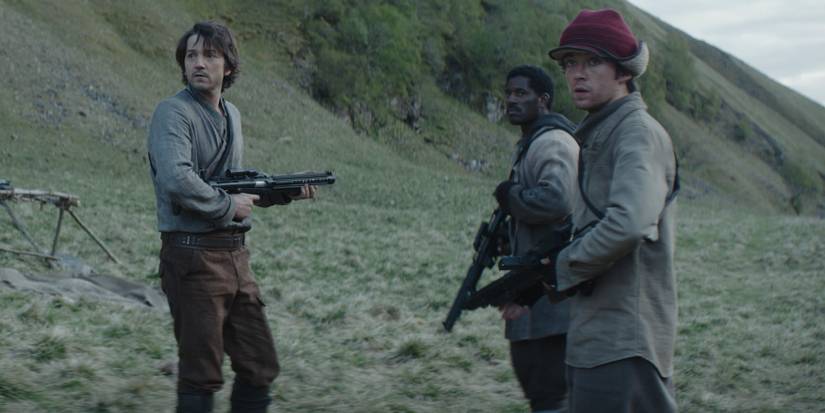 Cassian on a mountain with Rebels in Andor episode 5
