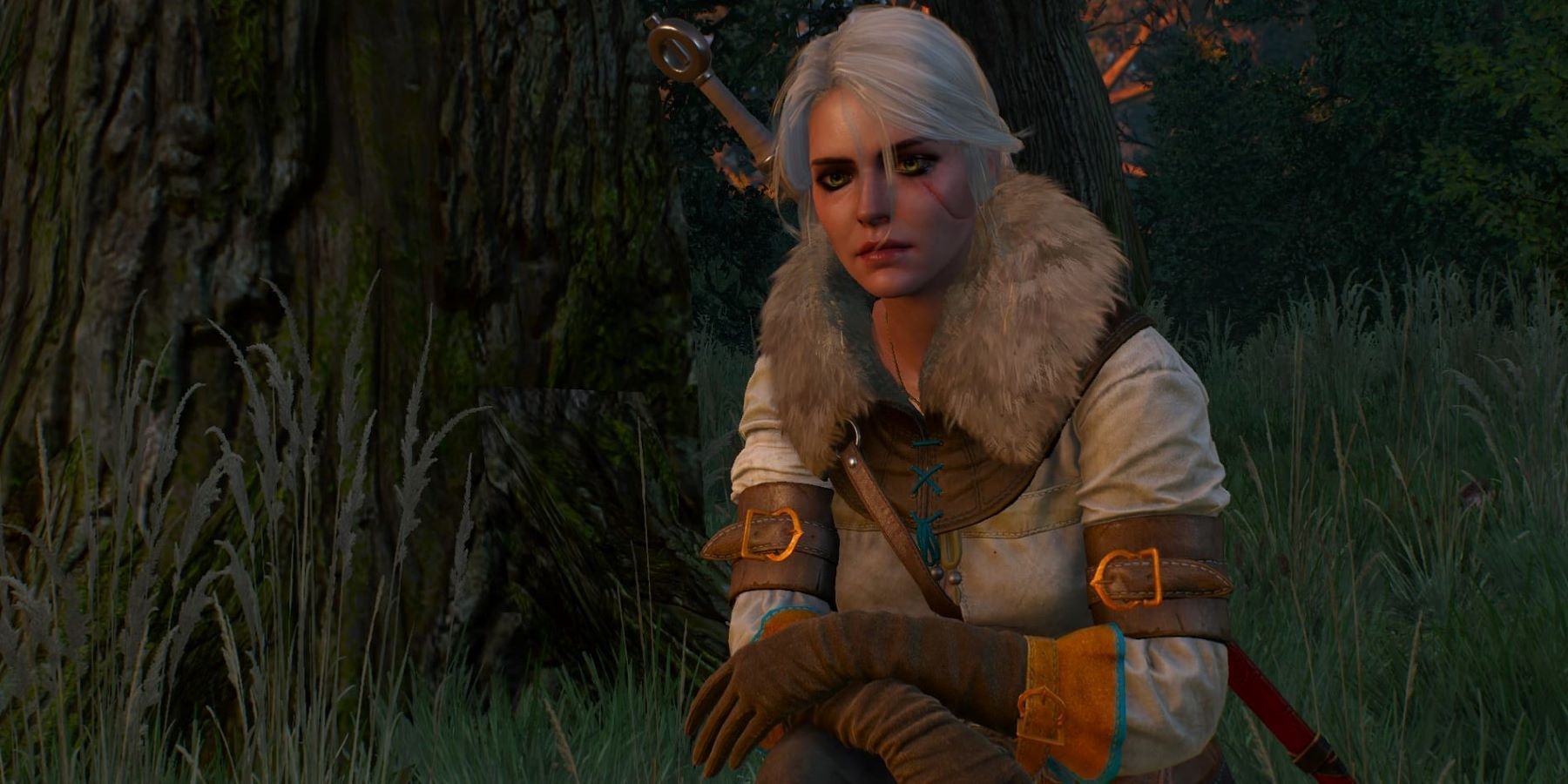 Ciri kneeling in a forest in The Witcher 3