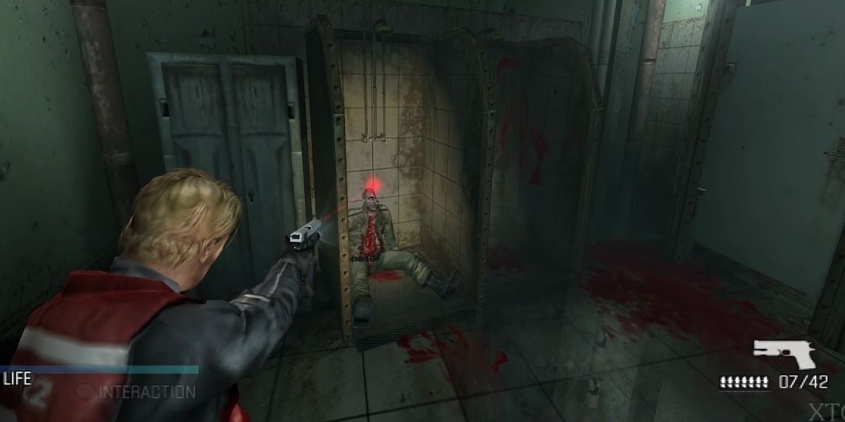 The main character aims their gun at the head of what appears to be a corpse slumped in a shower stall.