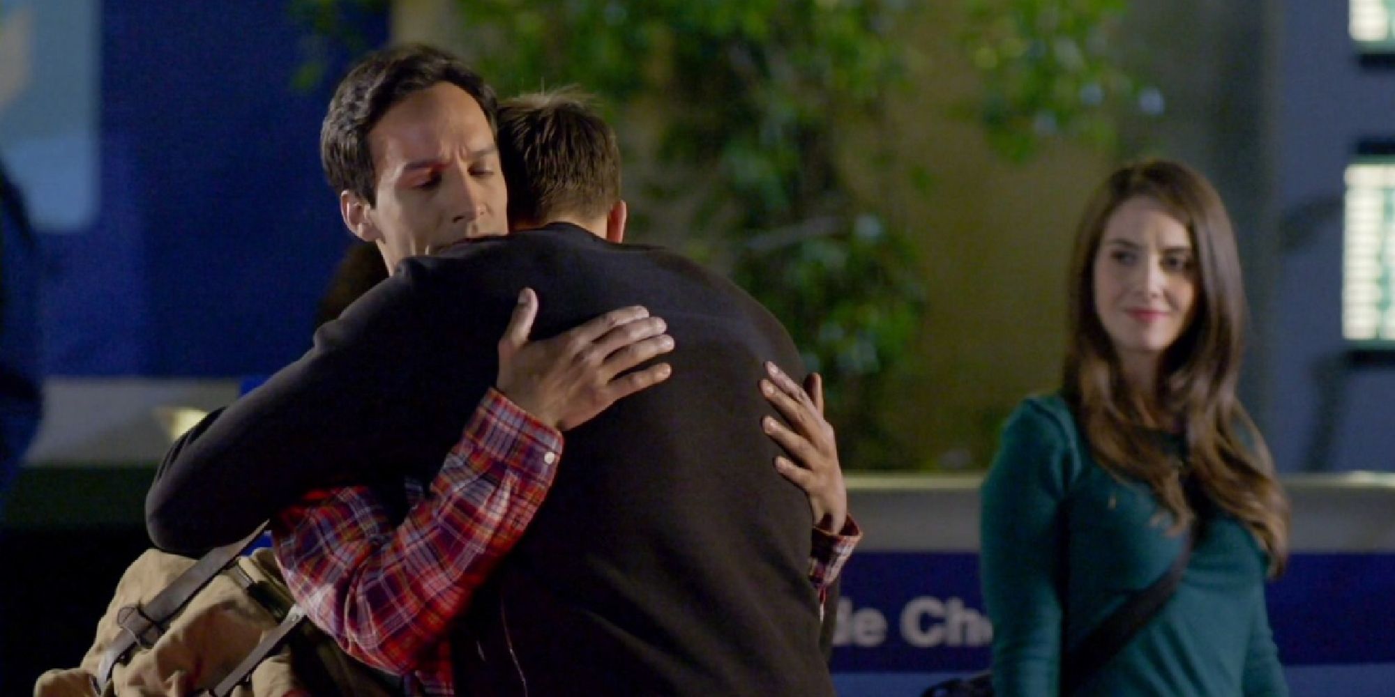 Jeff hugs Abed goodbye while Annie watches in the Community finale