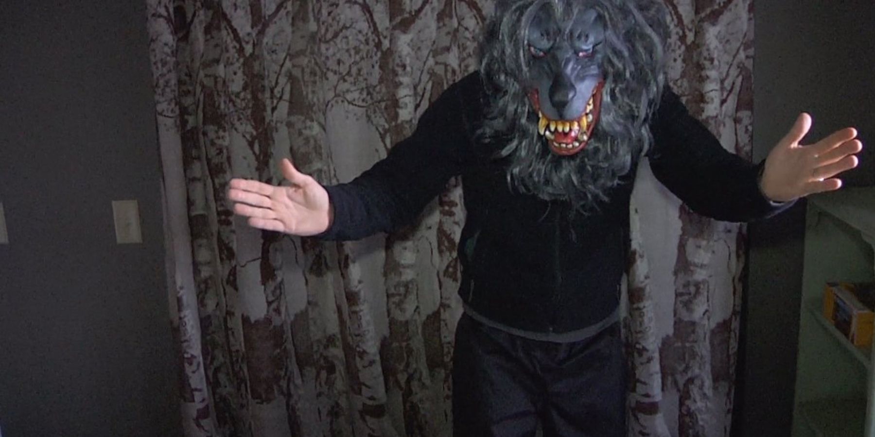 A man wearing an animal mask in Creep (2014)