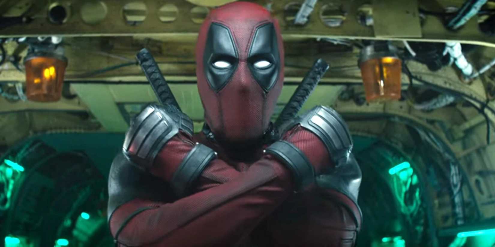 Deadpool making an X with his arms in Deadpool 2