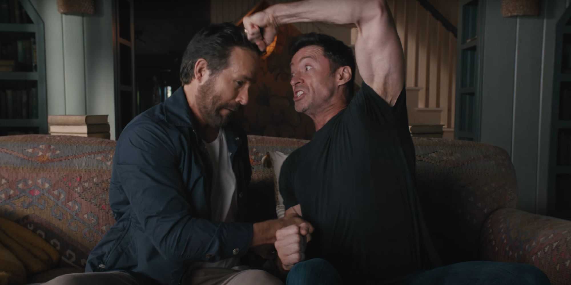 Ryan Reynolds and Hugh Jackman fake fighting in a promo for Deadpool 3