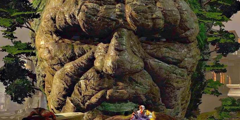 Kratos facing Gaia in God of War
