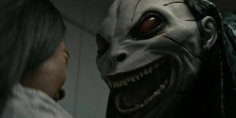 A woman crying at the monster Grimcutty