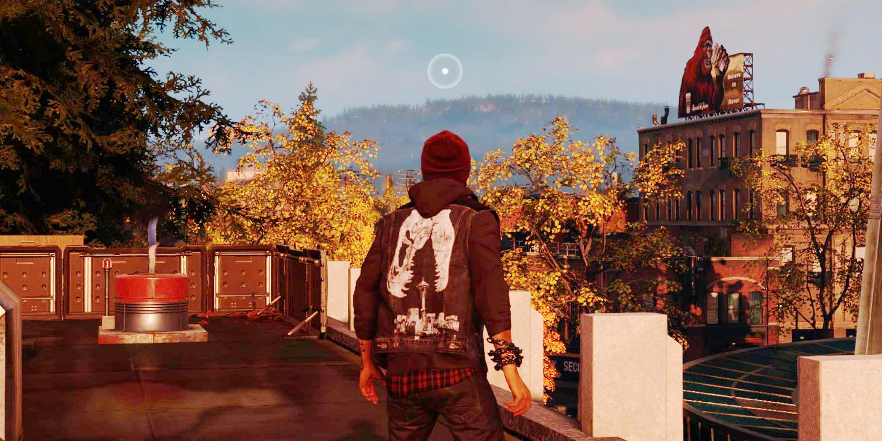 Infamous Delsin standing on top of a city building