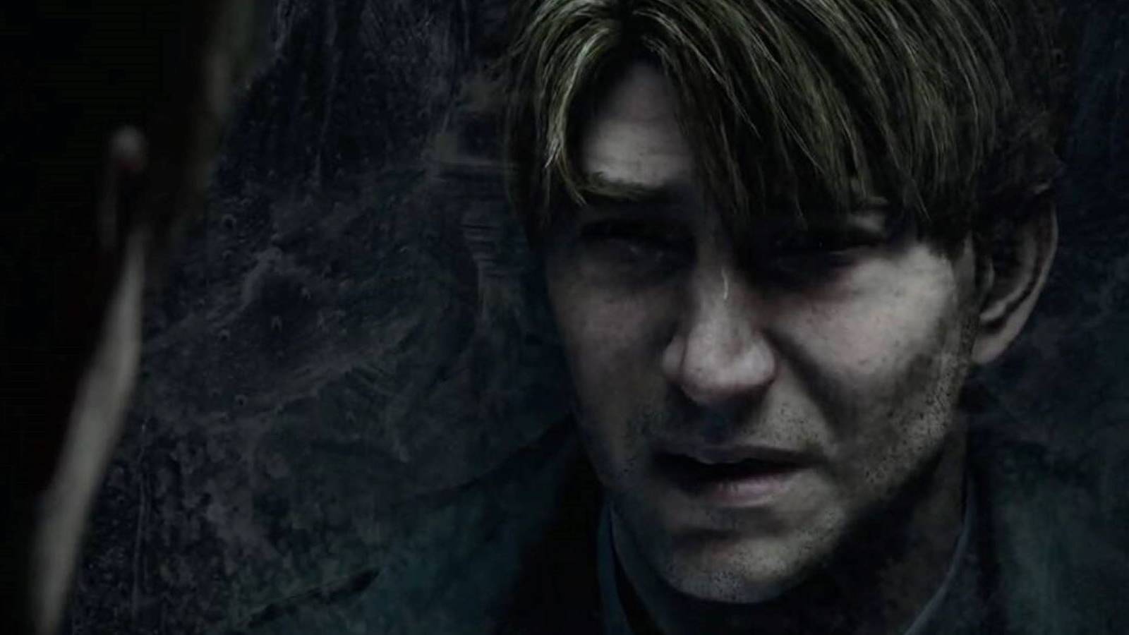 James looking at his reflection in the Silent Hill 2 remake