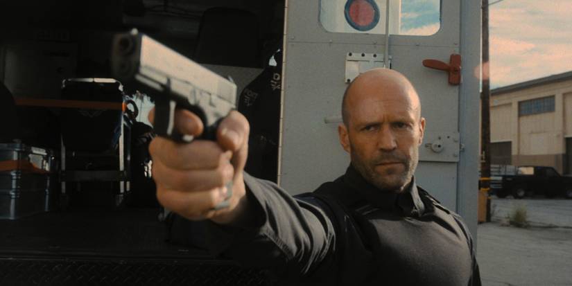 Jason-Statham-points-gun-in-Wrath-of-Man