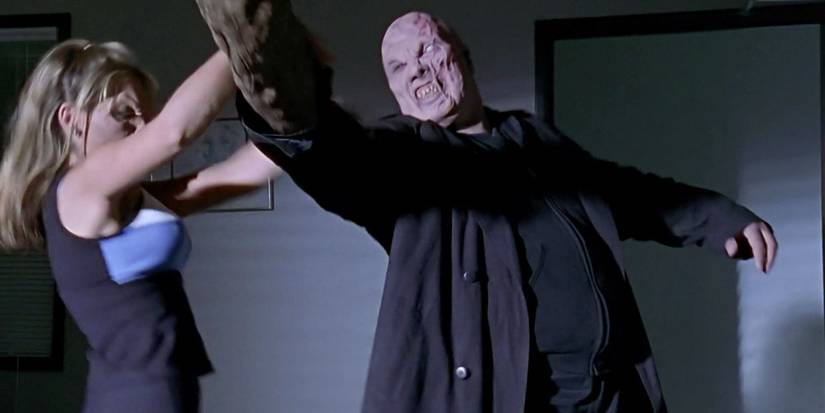 Vampire Buffy fights a demon in 'Nightmares'