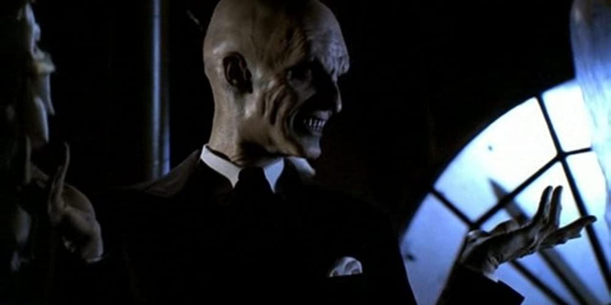 A gentleman smiles in the episode 'Hush', Buffy the Vampire Slayer