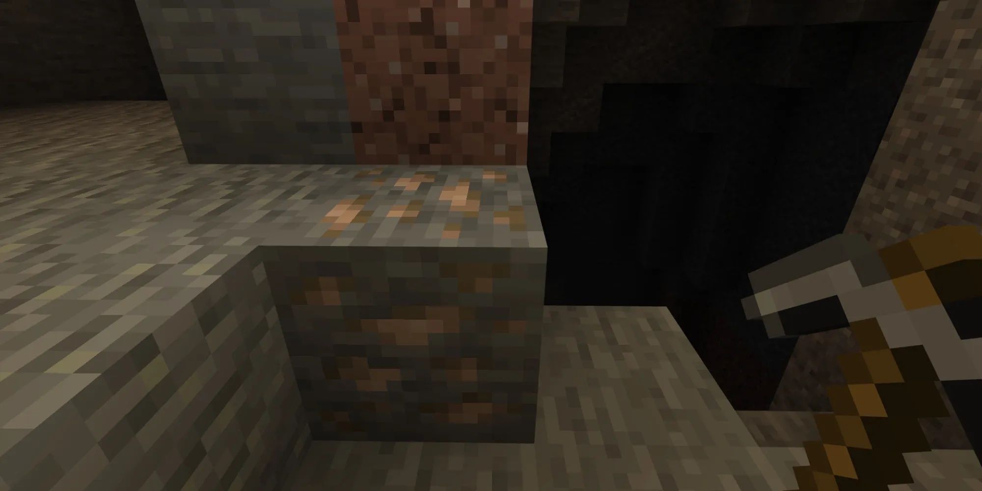 Iron ore in a cave in Minecraft