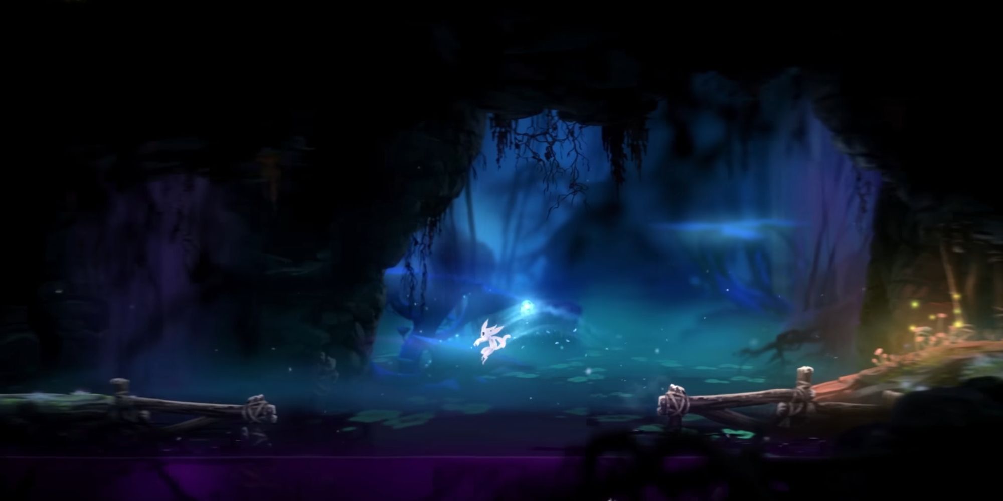 Ori leaps a swamp in the Blind Forest