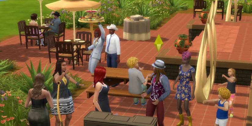 A group of sims partying in The Sims 4