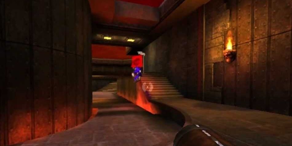 A player facing a flag in capture the flag in Quake 3 Arena