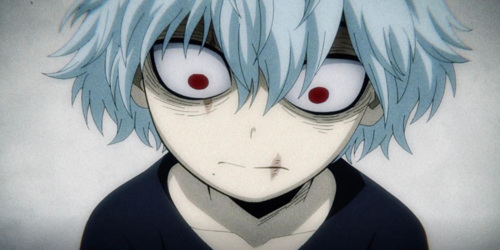 A young boy with greyish blue hair and several scars looking absent mindedly at the ground