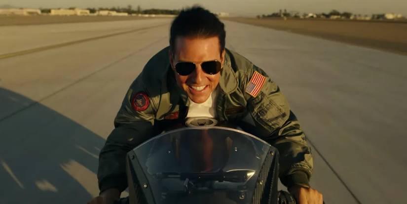 Tom Cruise riding a motorcycle in Top Gun Maverick