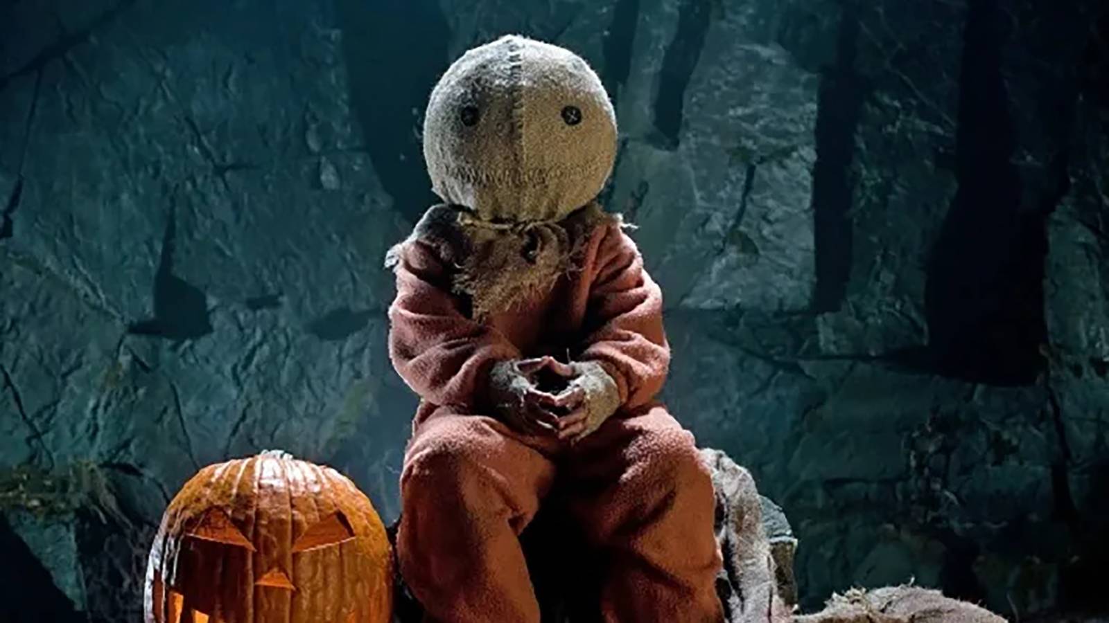 Sam sitting with pumpkins in Trick 'r Treat