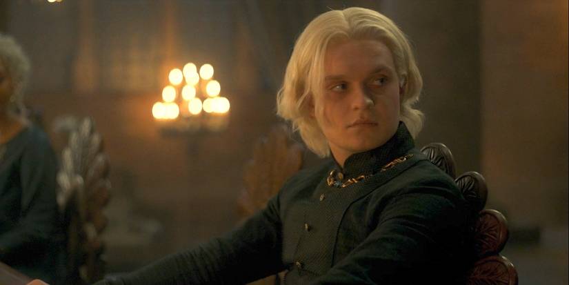 Aegon dining with his family in House of the Dragon.