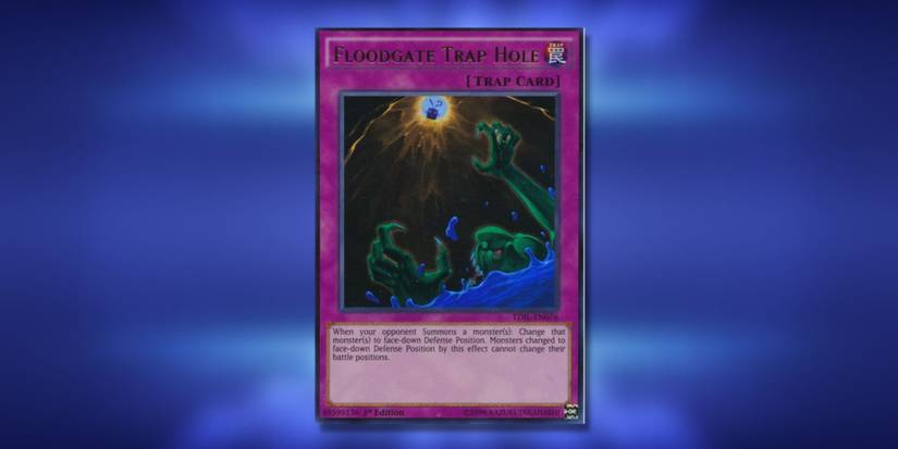 Yu-Gi-Oh! card 'Floodgate Trap Hole' on a blurred blue background.