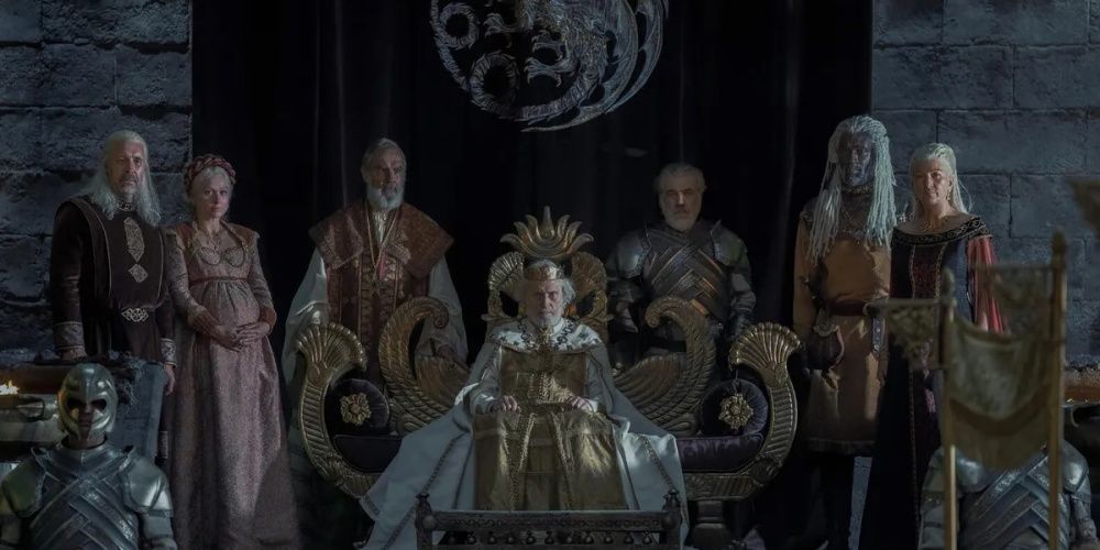 king jaehaerys on his throne with Rhaenys Targaryen