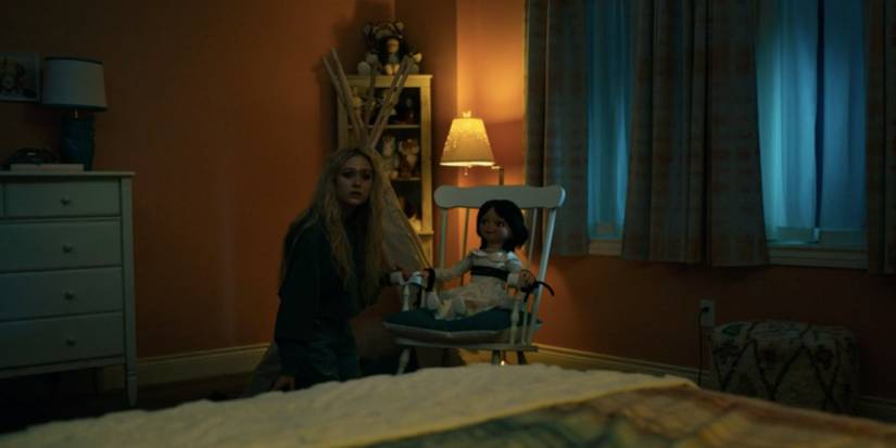 Lexy (Alyvia Alyn Lind) ties Belle doll to a chair in season 2 of Chucky