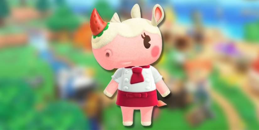 Merengue, a pink rhinocerous with cream coloured hair and a strawberry horn, on a blurred green background.