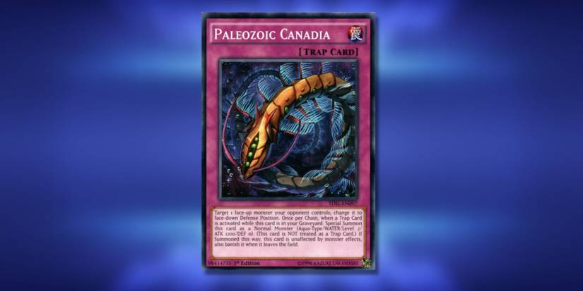 Paleozoic Candidia, a Yu-Gi-Oh card, on a blurred blue background.