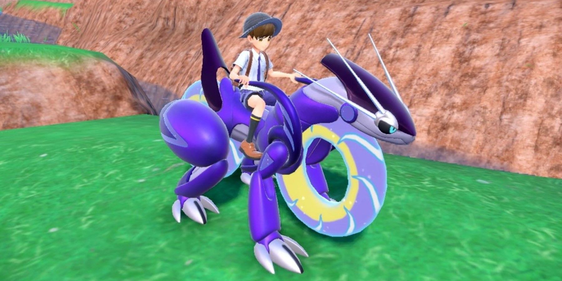 player riding miraidon pokemon scarlet and violet
