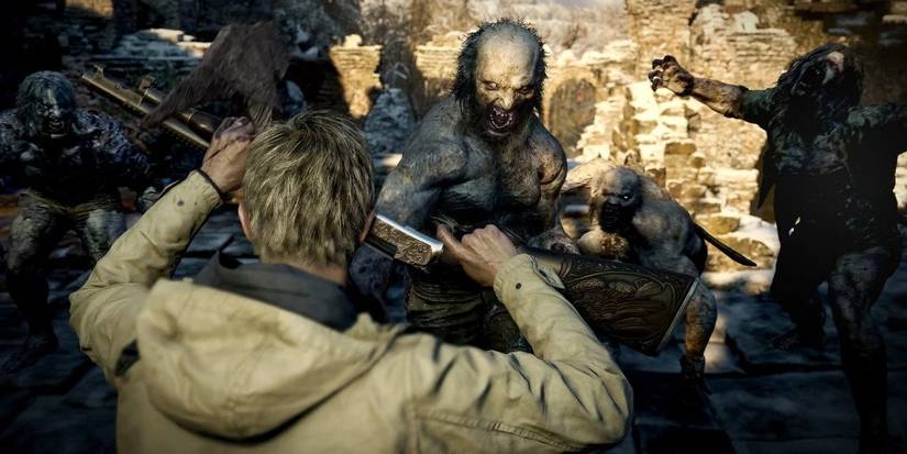 resident evil 8 ethan holding off werewolfs