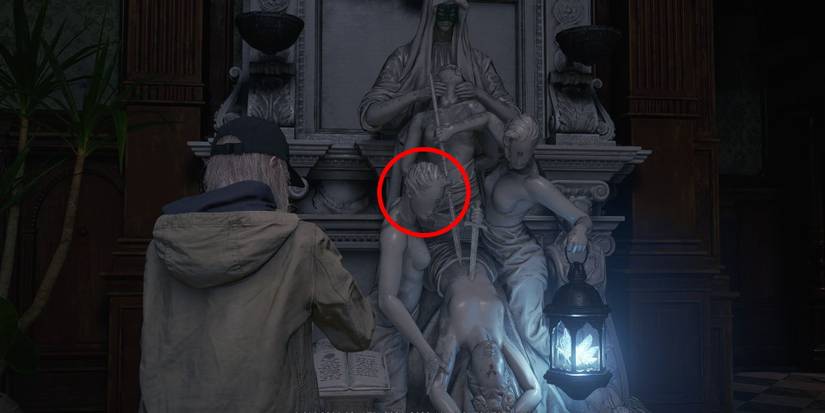 resident evil 8 village shadows of rose main hall statue bronze mask placement
