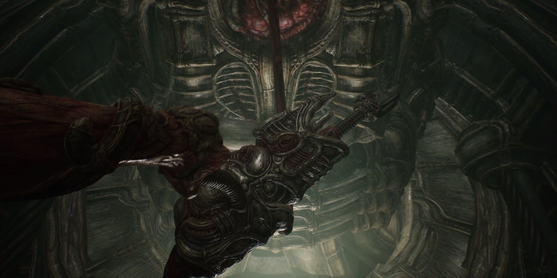 scorn player holding a large key 