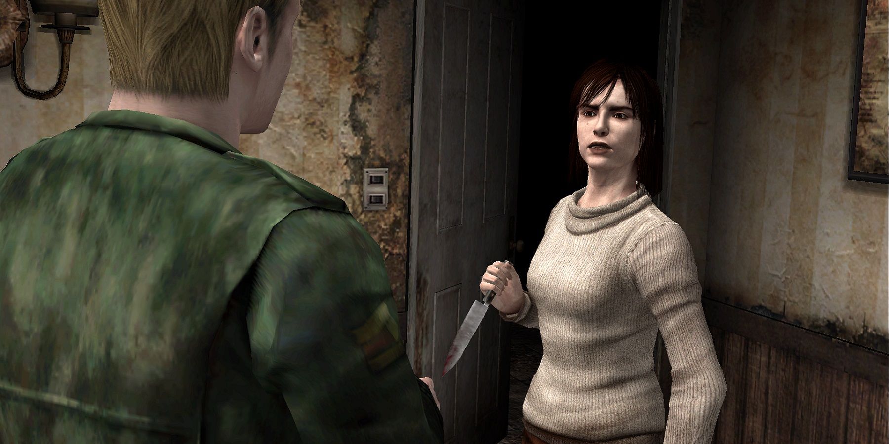 Скриншот из Silent Hill 2, показывающий, как Джеймс разговаривает с Анжелой, держащей нож.