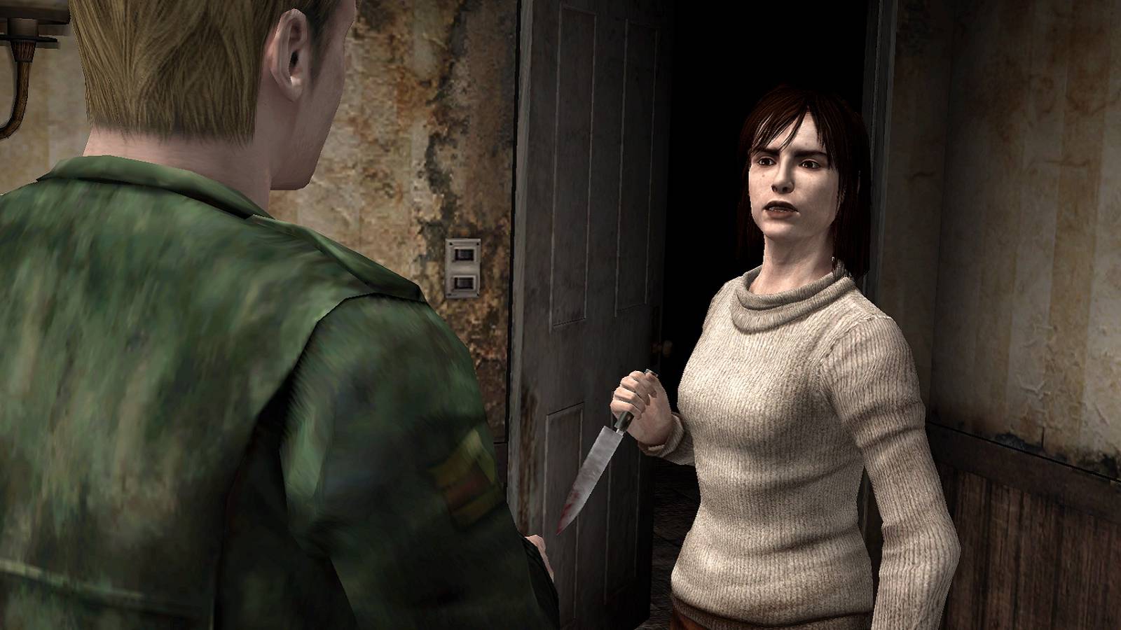 Screenshot from Silent Hill 2 showing James talking to Angela as she holds a knife.
